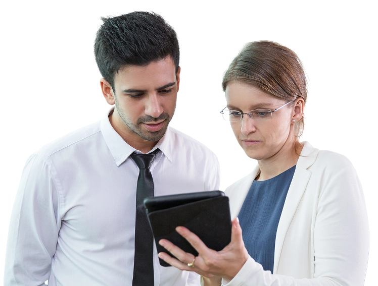 Salesforce professionals collaborating with laptop showing Ksolves and Salesforce logos